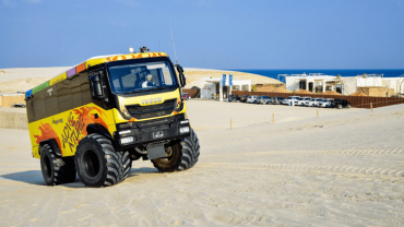 Monster Bus Tour in the Desert with Day Pass at Al Majles Resort