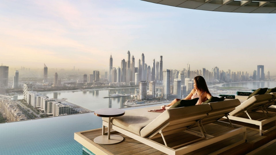 Aura sunrise pool experience with Burj view